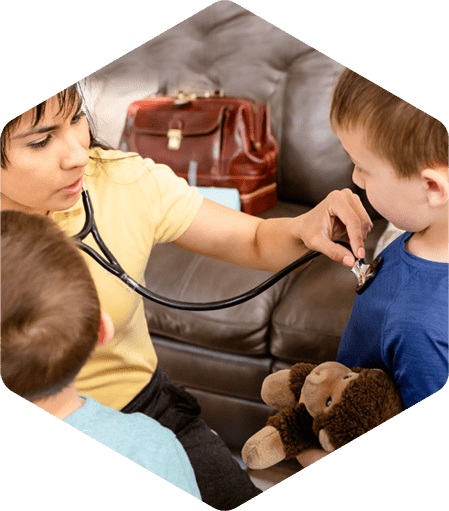 Pediatrician taking care of her patients by checking their heart rate